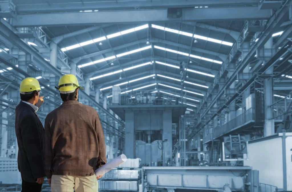 two building contractors inside facility